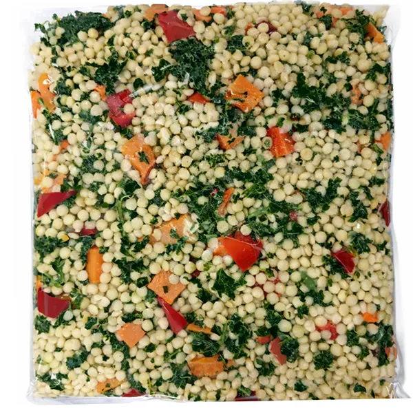 Mediterranean couscous with roasted vegetables and herbs prepared for healthy meal delivery.
