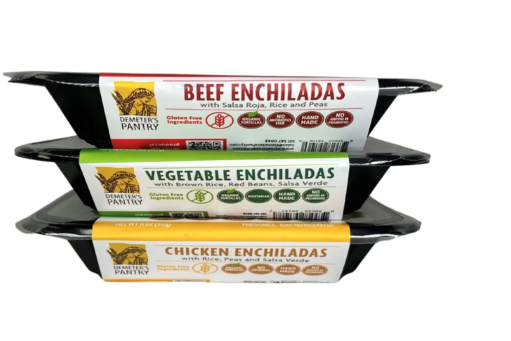 Demeter’s Pantry ready-to-eat enchiladas packaging showing beef, vegetable and chicken enchilada meals stacked in refrigerated trays