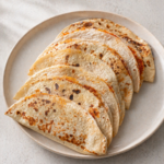 Lifestyle image of Chicken Salsa Roja Quesadilla by Demeter's Pantry