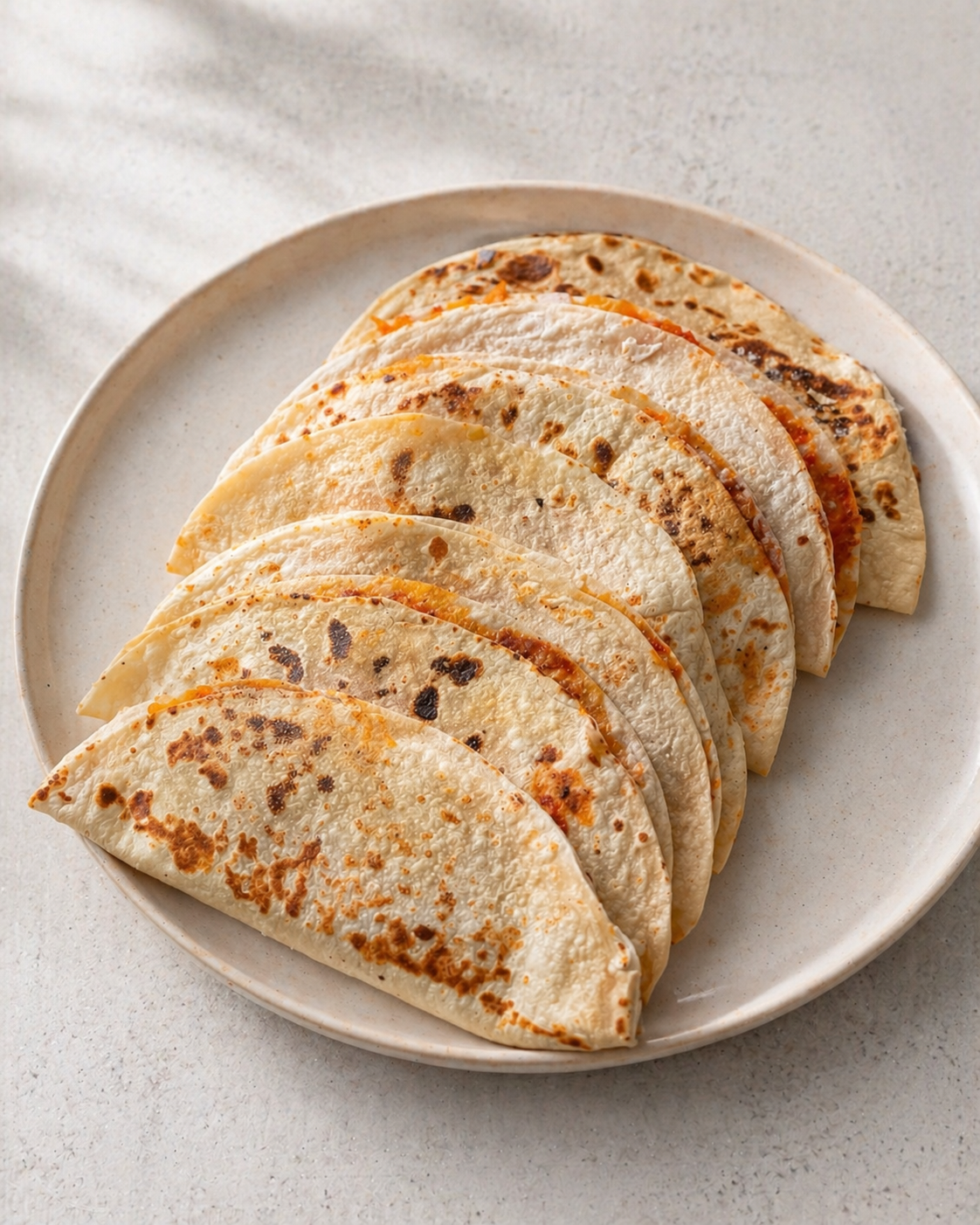 Delicious Chicken Salsa Roja Quesadilla Lifestyle image of Chicken Salsa Roja Quesadilla by Demeter's Pantry