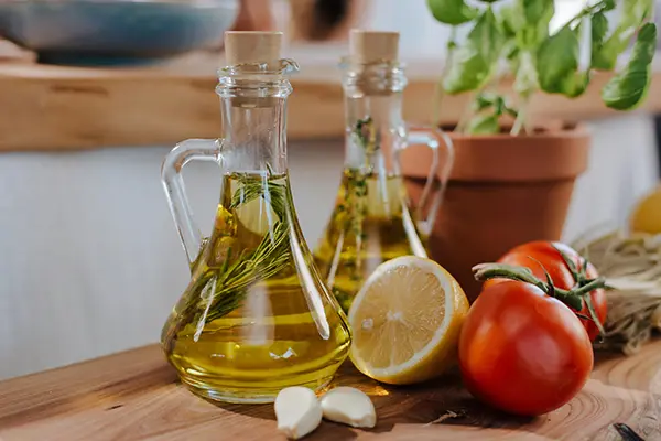Lifestyle of Mediterranean Extra Virgin Greek Olive Oil and basil