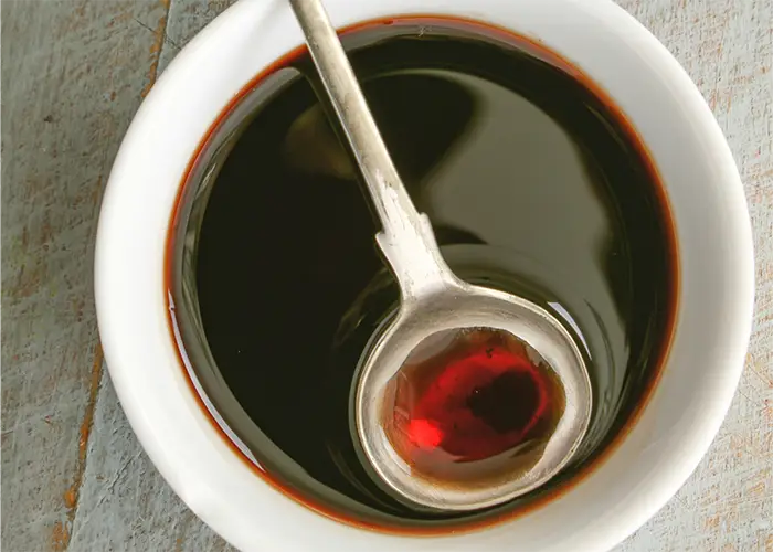 Red wine in a bowl used as a Mediterranean cooking ingredient for gourmet sauces and dishes