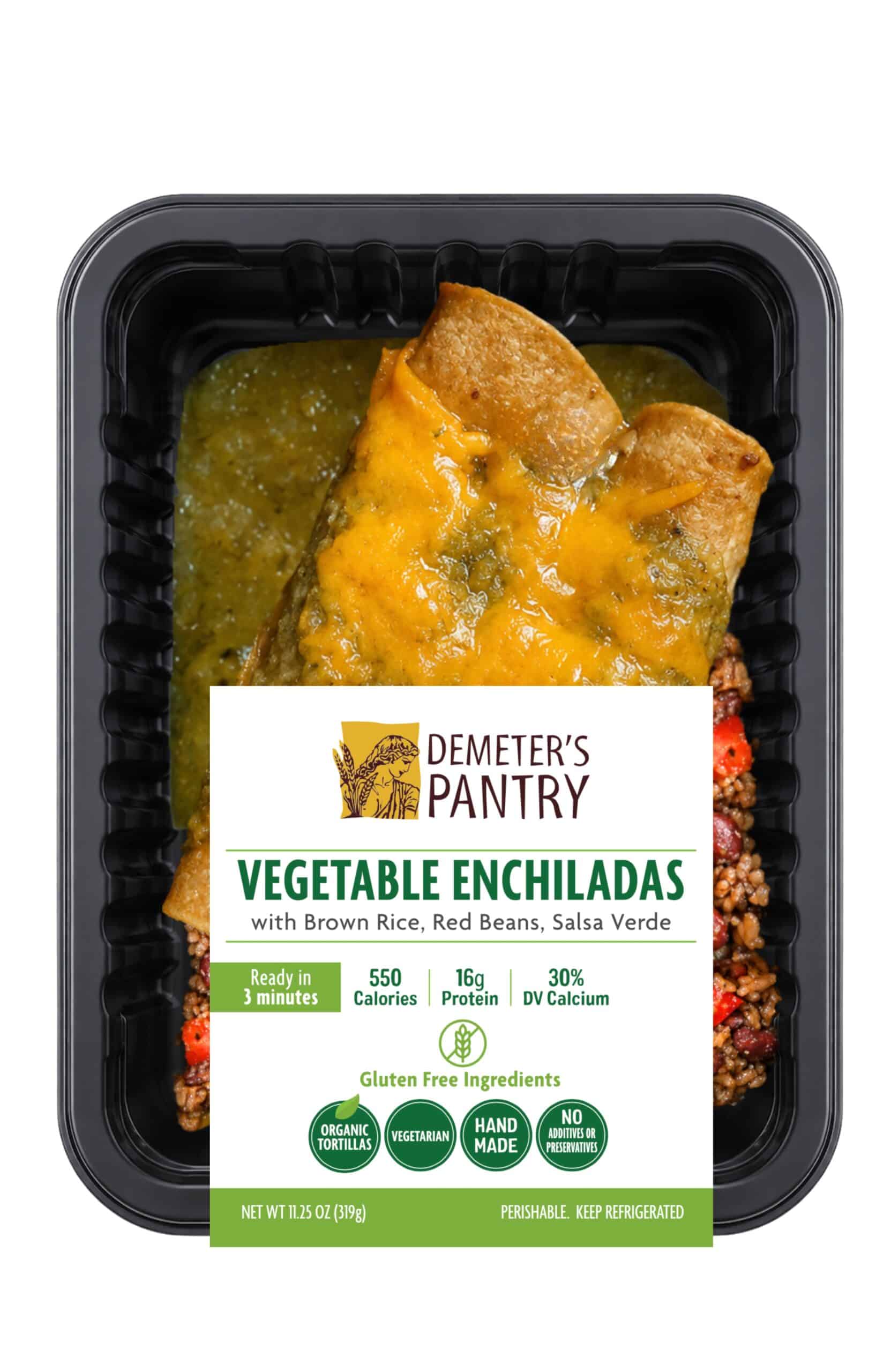 Vegetable enchiladas with brown rice, red beans, and salsa verde in black container.